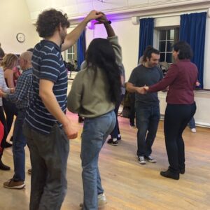 Salsa students in class with OnSalsa and Rosa